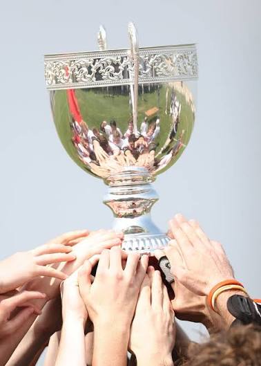 hands-reaching-for-trophy